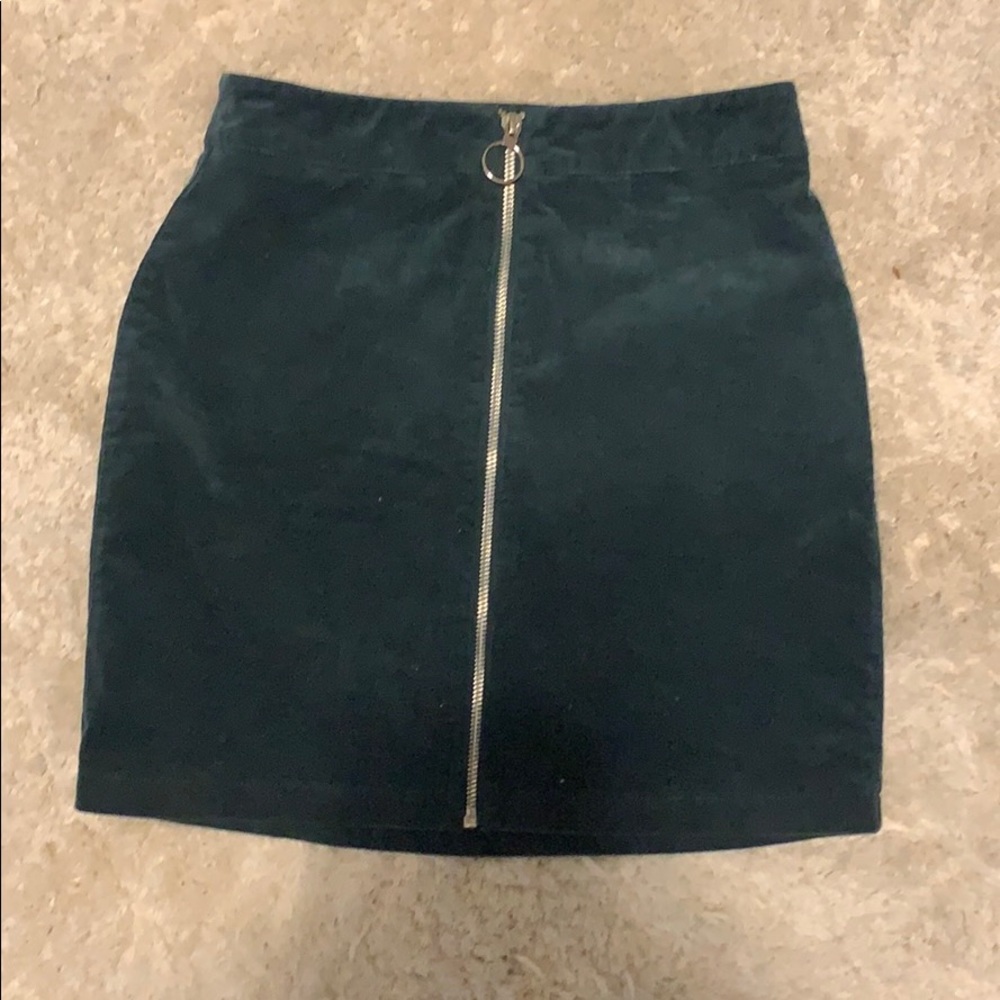 Dark green mini skirt